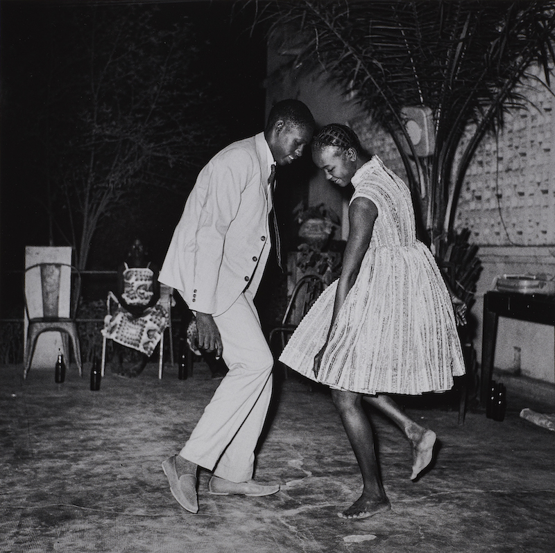 Malick Sidibé (Malian, 1936-2016). Nuit de Noël (Happy Club), 1972/2011. Gelatin silver print, 24 x 24 in. (61 x 61 cm). Brooklyn Museum; Frederick Loeser Fund and Alfred T. White, 2011.67.1. © Estate of Malick Sidibé (Photo: Brooklyn Museum)